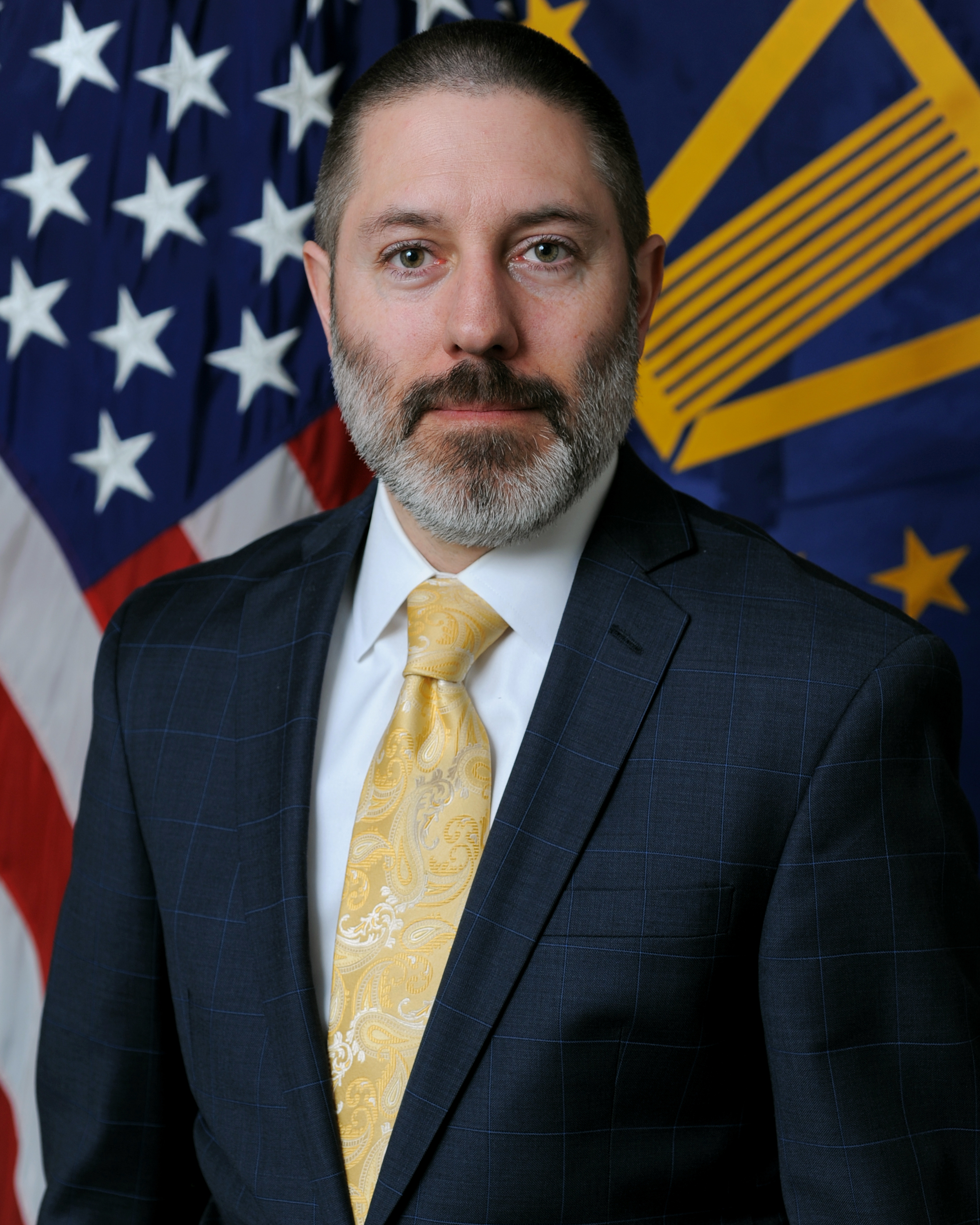 Mr. Tucker D. Hughes